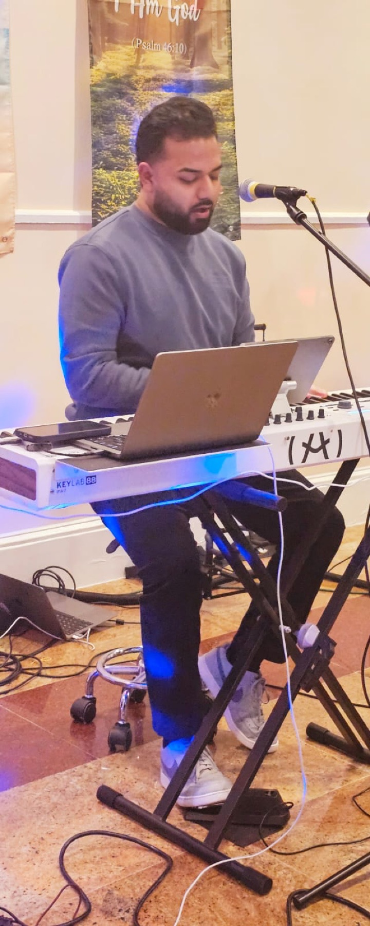 Youth keyboard during worship