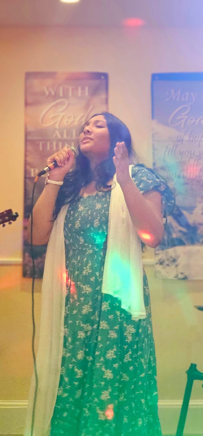 Youth singing in worship at Bethel